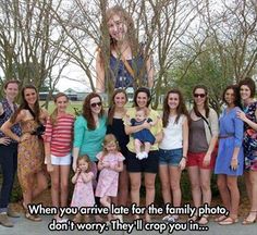 a group of women standing next to each other in front of trees and bushes with the caption, when you arrive late for the family photo, don't worry they'll drop you