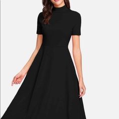 Size Large (Fits A Size Medium ) Black Stretch A-line Midi Dress, Black Fit And Flare Midi Dress With Short Sleeves, Black Plain Midi Length Dress, Black Knee-length Plain Dress, Chic Black Plain Dress, Black Plain Knee-length Dress, Chic Plain Black Dress, Black Short Sleeve Dress With Flattering Silhouette, Casual Black Midi Dress With Flattering Silhouette