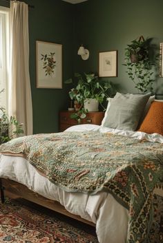 a bed sitting next to a window in a room with plants on the wall behind it