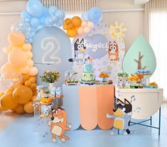 a birthday party with balloons and decorations