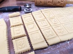 the cookie dough has been cut into squares and is ready to be put in the oven