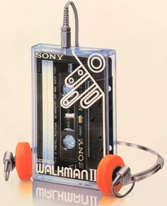 an advertisement for the sony walkman ii with headphones and earbuds on