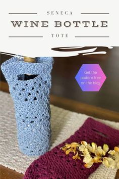 a crocheted wine bottle holder with flowers next to it and the text overlay reads