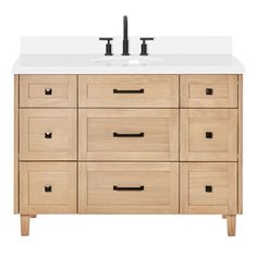 an image of a bathroom vanity with two faucets on the top and one sink