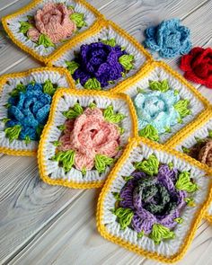 several crocheted squares with flowers on them