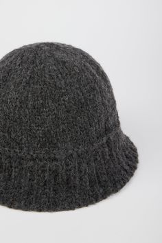 - Measurements: 1. Circumference: 60cm, 2. Length : 16cm- Materials: 50% acrylic, 30% wool, 20% nylon- Thickness: Moderate- Sheerness: None- Stretch: None- Lining: None- Care: Dry clean or hand wash cold and dry in shade Casual Wool Soft Knit Hats, Casual Soft Knit Wool Hats, Casual Wool Bucket Hat With Curved Brim, Casual Wool Brimmed Beanie, Casual Brimmed Wool Beanie, Casual Wool Bucket Hat For Winter, Knitted Wide Brim Cloche Hat For Winter, Winter Wide Brim Knitted Cloche Hat, Winter Knitted Wide Brim Cloche Hat