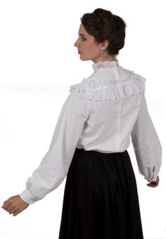 This charming blouse is perfect for your next turn-of-the-century dinner party! The ribbon trimmed lacy ruffle creates a striking appearance to this Edwardian style blouse. The long sleeves are gathered to a buttoned cuff. Blouse has back button closure. Hand wash or machine wash gently. Tumble dry low or hang dry. 100% cotton. Poly lace. The model is wearing a skirt and brooch and they are both priced separately. Recollections clothing is made in America. The following are approximate finished Formal Lace Trim Blouse For Fall, Formal Long Sleeve Blouse With Lace Trim, Long Sleeve Blouse With Lace Trim For Daywear, Long Sleeve Victorian Dress With Ruffles For Daywear, Victorian Style Formal Blouse For Spring, Spring Victorian Blouse For Formal Occasions, Formal Blouse With Lace Trim And Ruffled Collar, Feminine Victorian Dress With Ruffles And Long Sleeves, Long Sleeve Feminine Victorian Dress With Ruffles