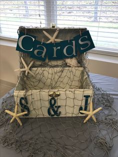 a cake made to look like a fishing net with starfish and words on it