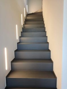 a set of stairs leading up to an empty room