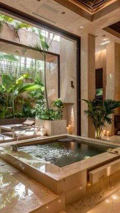 an indoor hot tub with candles and plants