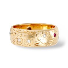 We chose this diamond band for it's one of a kind etched floral pattern. We love a special yet subtle detail. Solid 14k Yellow GoldSize 7.59 Diamonds4 Rubies Cannot be re-sized Build your own ring stack with any of our rings, from vintage estate rings to diamonds and dainty stacking rings, we've hand selected the best styles for ease of styling with anything and everything. Fine Jewelry Engraved Ring With Decorative Band, Heirloom Engraved Diamond Ring, Heirloom Diamond Cut Bands, Fine Jewelry Engraved Diamond Ring Stamped 14k, Heirloom Diamond Ring Engraved, Heirloom Diamond Engraved Ring, Heirloom Diamond Ring With Engraving, Engraved Diamond Ring Stamped 14k Fine Jewelry, Engraved Diamond Ring Stamped 14k