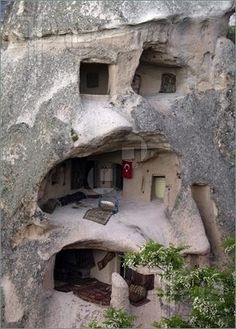 the rock house is built into the side of the mountain