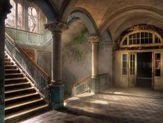 an old building with stairs and windows