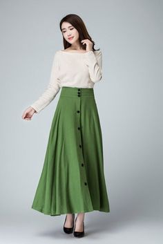 "This chic light green maxi skirt created with a soft linen, design with a fit and flare silhouette for a feminine feel , completed with a fitted waist for a defined figure. DETAIL * Soft linen * 50% linen , 50 cotton * No lining * Seam pocket * Right side zipper closure * Ankle Length * A Line skirt, button front skirt * Wash by hand or machine with cold water * Perfect spring, summer, autumn SIZE GUIDE Size vary between Brand and Country Please get your body measurement with our Size Guide And Green A-line Maxi Skirt For Spring, Chic Green A-line Maxi Skirt, Spring Buttoned Maxi Skirt, Buttoned Maxi Skirt For Spring, Green A-line Maxi Skirt For Summer, Spring Maxi Skirt With Buttons, Green Wide-leg Lined Maxi Skirt, Green Wide Leg Lined Maxi Skirt, Elegant Buttoned Flared Maxi Skirt