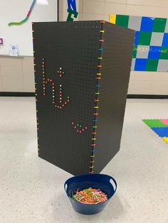 a box that is made out of legos and some sprinkles