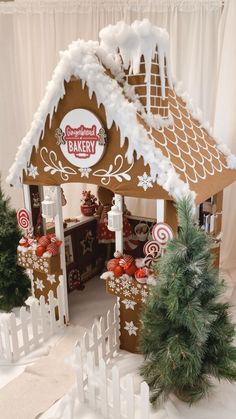 a gingerbread house is decorated for christmas