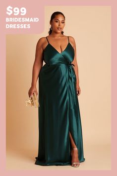 This satin wrap dress is an absolute stunner. Any bridesmaid will love how our Cindy dress flatters, emphasizing her natural waistline and elongating her frame. Perfect for a formal affair, our shimmering satin amps up the glam. The skys the limit when it comes to accessorizing Cindy. She pairs beautifully with dangly earrings or a dramatic statement necklace. Plus Size Satin Dress, Emerald Bridesmaid Dress, Jewel Tone Bridesmaid, Emerald Bridesmaid, Emerald Green Bridesmaid Dresses, Cindy Dress, Emerald Bridesmaid Dresses, Bridesmaid Satin, Satin Gowns