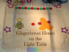 the gingerbread house on the light table is decorated with candy and candies for children's birthdays