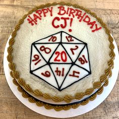 a birthday cake with the number twenty five on it and a dieing dice in the middle