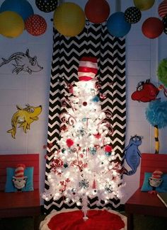 a cat in the hat christmas tree is lit up with lights and dr seuss