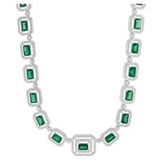 Designer: custom Material: 14K white gold Diamond: 801 round brilliant cut = 7.23cttw Color: G Clarity: VS-SI1 Emerald: 31 = 18.14cttw AAA+ Dimensions: necklace measures 16-inches in length Weight: 37.00 grams Luxury Emerald Diamond Necklace, Luxury Diamond Cut Emerald Necklace For Anniversary, Luxury White Gold Emerald Diamond Necklace, Luxury Brilliant Cut Emerald Necklace For Anniversary, Luxury Emerald Necklace With Brilliant Cut For Anniversary, Formal Emerald Diamond Necklace In White Gold, Formal White Gold Emerald Diamond Necklace, Luxury Platinum Diamond Necklace With 17 Jewels, Formal Brilliant Cut Diamond Emerald Necklace