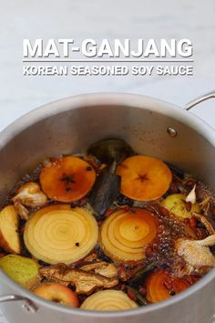 a pot filled with food sitting on top of a table