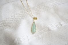 Complete your evening looks with this exquisite Natural Jade Drop Necklace. Handcrafted from lustrous jade, this elegant piece features an eye-catching drop design for a truly glamorous look. Redefine your style with an enduring piece of natural beauty and artistry. Feel the elegance and unique style of this timeless jewelry. • How To Order 1. Choose the size. 2. Select initials, if you do not want any initial, select "NONE"(UPPER CASE and HEART Shape Available) 3. Add to cart and submit order : Elegant Jade Necklace Round Shape, Elegant Jade Round Necklace, Teardrop Gemstone Necklace For Parties, Elegant Round Jade Necklace, Elegant Jade Round Pendant Jewelry, Elegant Green Pendant Drop Necklace, Elegant Teardrop Gemstone Necklaces, Elegant Jade Necklace, Elegant Pendant Drop Necklace As Gift