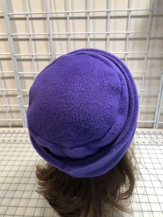 I made this warm pillbox style hat out of purple plum fleece for warmth and comfort. The stand and top are a double layer of fleece. It's sized to fit most adults 21.5-23 inches around head. It has a nice stretchy feel and is completely machine washable and dryable. Purple Felt Hat With Short Brim For Winter, Purple Brimmed Felt Hat For Winter, Purple Short Brim Felt Hat For Winter, Winter Purple Felt Hat With Short Brim, Purple Short Brim Winter Hat, Fleece Hat Pattern, Fleece Sewing Projects, Winter Fur Hat, Sewing Hats