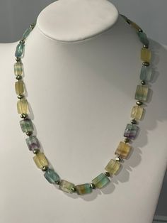 Appraised back in 2016 for $1527. This necklace features  26 amethyst beads that are multicolored purple, green, yellow rectangled. This necklace also has 26 freshwater pearls.  It is 20 inches in length Multicolor Rectangular Necklace With Natural Stones, Multicolor Rectangular Necklaces With Natural Stones, Multicolor Rectangular Gemstone Beads Jewelry, Multicolor Gemstone Fluorite Jewelry, Rectangular Multicolor Jewelry With Natural Stones, Rectangular Multicolor Necklaces With Natural Stones, Multicolor Fluorite Gemstone Jewelry, Turquoise Cushions, Pearl Cuff Bracelet