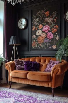 a living room with purple and orange decor