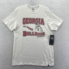 New '47 Brand University Of Georgia Bulldogs Short Sleeve T-Shirt Men's Medium New With Tags In Excellent Condition Measurements Are Posted For You To Look At Within The Listing Photos Prior To Purchase Enjoy Lightning Fast Shipping Message Response Times I Ship Items Every Day, You Can Expect Your Order To Be Sent Out Within 1 Business Day And Tracking Provided Browse Our Store To See Other College Ncaa Apparel And More! Bulldogs Shirt, Plain Black Tee, Georgia Bulldogs Shirt, Nascar T Shirts, Bulldog Shirt, University Of Georgia, 47 Brand, Calvin Klein Men, Georgia Bulldogs