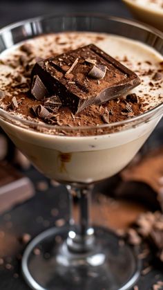 a chocolate dessert in a glass on a table