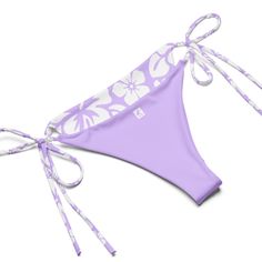 Indulge in the luxurious and exclusive style of our White Hawaiian Flowers on Lavender String Bikini. This beautiful string bikini set is not only comfortable, but it also offers double-layering and UPF 50+ protection. Customize the straps to your liking and get ready to turn heads at the beach! Made from soft recycled polyester, this bikini is both stylish and sustainable.• Soft and stretchy material with UPF 50+• Sizes up to 6XL• Bikini top comes with removable padding for comfort• Multiple wa Purple Swimwear With Adjustable Straps For Beach, Lavender Beachwear Swimwear For Sunbathing, Lavender Summer Swimwear For Sunbathing, Lavender Summer Swimwear For Beach, Lavender Swimwear For Sunbathing Beach Season, Lavender Swimwear For Sunbathing, Lavender Summer Swimwear For The Beach, Lavender Swimwear For Sunbathing During Beach Season, Summer Lavender Swimwear For The Beach