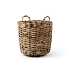 a wicker basket with handles on the front and side, sitting against a white background