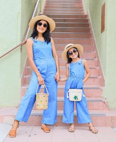 "This Chambray M O M M Y + M E jumpsuit is MUST HAVE this summer! Plus, it has pockets I T E M D E S C R I P T I O N * Material: 95% Polyester 5% Spandex * Sizing runs true to size * Back white zipper on Adult * It has pockets!! * Calf length * Sizing runs true to size; fitted. We only recommend sizing up if you would some extra wiggle room. * Infant sizes include snaps between the legs to make diaper changes easy and fuss-free. S I Z I N G Adult: S: Length 52.5\" | Chest 34\" | Waist 29\" | Leg Playful Cotton Jumpsuits And Rompers For Vacation, Playful Summer Jumpsuits And Rompers For Playdate, Sleeveless Matching Set Jumpsuits And Rompers For Summer, Trendy Cotton Jumpsuits And Rompers For Vacation, Sleeveless Summer Jumpsuits And Rompers Matching Set, Casual Sleeveless Jumpsuit And Romper Matching Set, Casual Sleeveless Jumpsuits And Rompers Matching Set, Casual Sleeveless Jumpsuit And Romper Set, Summer Beach Matching Set Jumpsuit And Romper