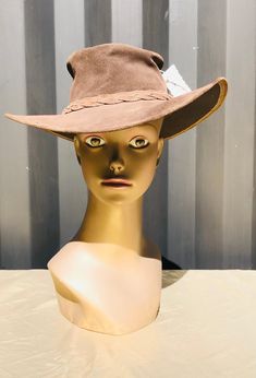 This vintage handcrafted Australian Stockman western style leather oil hat is slightly used in good condition. Made in Australia this leather hat is a nice flexible leather with a breaded leather band embellishment. Measurements: Label Reads Small Height: 3.5" inches Top Hat Portion Width: 6" inches Brim: 3" inches Head Size: 21 1/2" inches We do our best to take live, clear and as many pictures as possible to guarantee what you see is what you will receive. Any issues with the purchased product Australian Stockman, Western Steampunk, Steampunk Western, Western Hat, Leather Hat, Steampunk Accessories, Vintage Type, Western Hats, Leather Hats