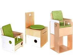 three children's wooden furniture including a chair, table and stool with green cushions