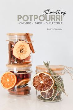 three jars filled with dried fruit and spices