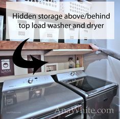 a woman holding up a shelf above a washer and dryer