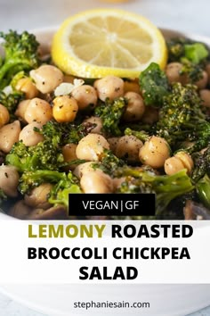 broccoli and chickpea salad with lemon on the side in a white bowl