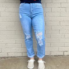 Be the definition of effortless style with the Perfectly Balanced Denim. These high-waisted mom jeans feature shredded knee holes and a distressed hem, plus a button closure and zip fly. Rock 'em with a tucked-in blouse and statement earrings for a look that won't even break a sweat! Five pocket styling, high rise light wash denim—it's jeans perfection! High Waisted Mom Jeans, Light Wash Denim, Effortless Style, Statement Earrings, Mom Jeans, High Rise, High Waisted, Best Deals