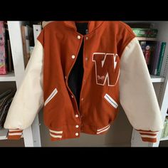 This Was Framed And Never Worn. The Arms Are Real Leather And The Fabric Is Real Wool. The Jacket Buttons Nicely And Is Insulated. White Hooded Varsity Jacket For Fall, Casual White Varsity Jacket For Fall, White Hooded Varsity Outerwear, White Varsity Jacket For College In Fall, White Long Sleeve Varsity Jacket For Winter, White Long Sleeve Varsity Jacket For Fall, Vintage White Varsity Jacket For College, Retro White Outerwear With Pockets, White Varsity Jacket With Pockets For Winter