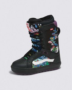 a pair of black snow boots with graffiti print