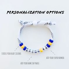 a white bracelet with blue and yellow beads that says, personalization options choose your bead colours add your name or phrase