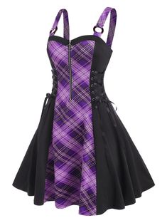 a woman wearing a purple and black plaid dress with suspenders on the waist,