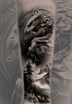 an eagle tattoo on the back of a man's arm with mountains and trees in the background