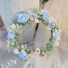 Our Forest-Inspired Floral Wreath is a cascade of layered flowers that exudes elegance with its natural draping texture and delicate, unique colors. The vibrant hues bring out the lively and spirited beauty of the arrangement, making it a captivating addition to any setting. Primrue Wreath Color: Blue | Primrue Forest-Inspired Floral Wreath in Blue | 1" H X 19.69" W X 19.69" D | Wayfair Circle Flower Frame Blue, Blue Flower Dried Wreath, Bridal Headdress, Bridesmaid Hair Accessories, Ivory Roses, Bridesmaid Accessories, Pillows Flowers, Flower Hair Accessories, Head Shapes