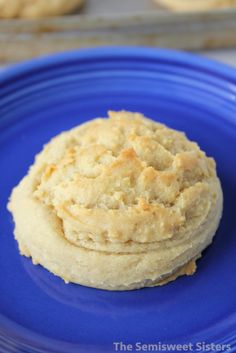 a close up of a cookie on a blue plate