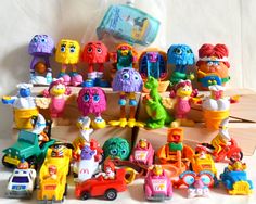 a bunch of toys that are sitting on a table