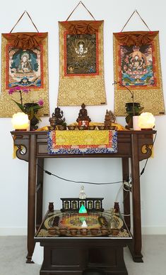 Buddhist altar with statues and thangka paintings Tibetan Buddhist Altar, Buddhist Monastery Interior, Buddhist Altar Design, Buddha Altar Ideas, Buddhist Altar Home Ideas, Buddhist Altar Home, Japanese Meditation Room, Buddha Altar, Arte Ganesha